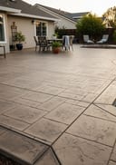Travertine-look pool deck with natural stone finish